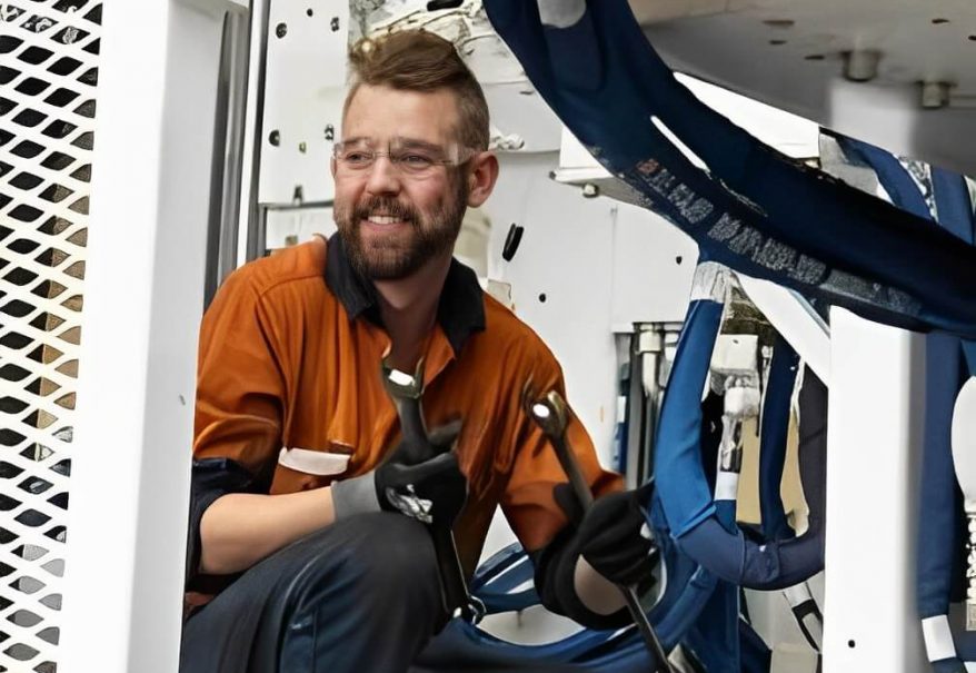 Man Holding a Wrench — Mining Equipment in Kurri Kurri, NSW